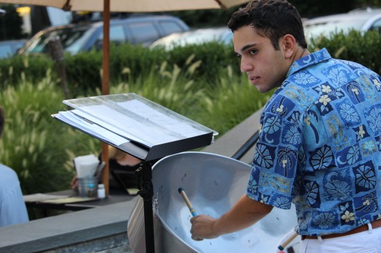 Stephen Blinder, 16, playing the steel drums at the Wilton Steel Community Band’s performance on Tuesday, Aug. 16, at Wilton Pizza, 202 Town Green.