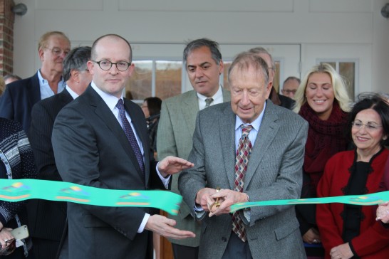 George Ciaccio, chairman emeritus of Wilton Commons, cuts the ribbon at the ceremony for Wilton Commons Congregate.